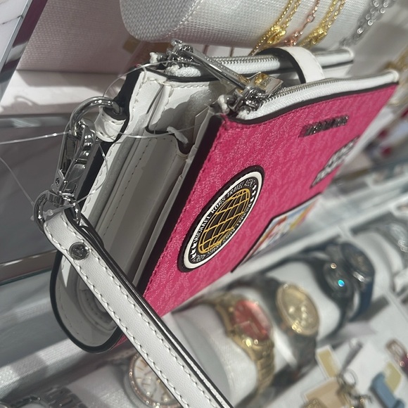 Michael Kors Jet Set Travel Lg Embellished Signature Logo Wristlet
Dragonfruit - Picture 16 of 16